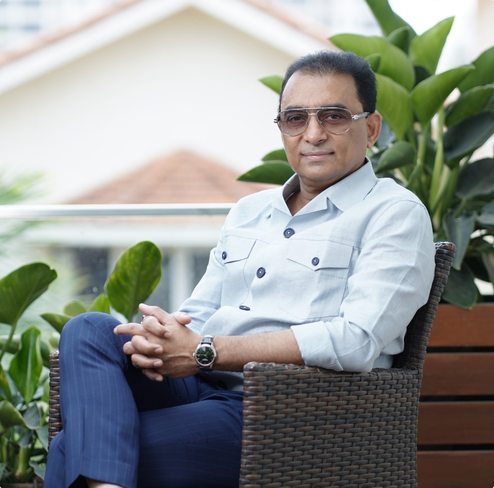 Portrait of D. Kishore Reddy, Chief Managing Director and Founder of Mana Projects Private Limited, a prominent real estate developer in Bengaluru.